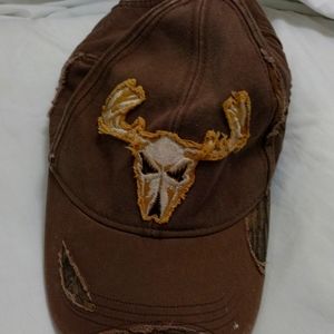 Buckwear Hunter to the Bone Cap. Velcro back closure. Like new condition.